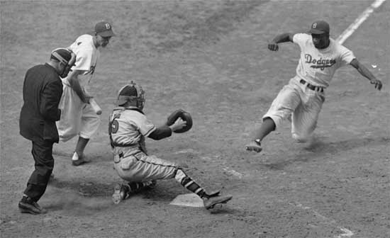 Jackie Robinson steals home in the 1955 World Series