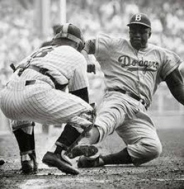 Jackie Robninson stealing home in the 1955 World Series