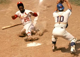 Lou Brock steals home!