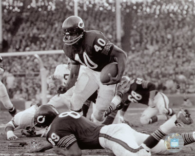 Gayle Sayers leaping over Ditka